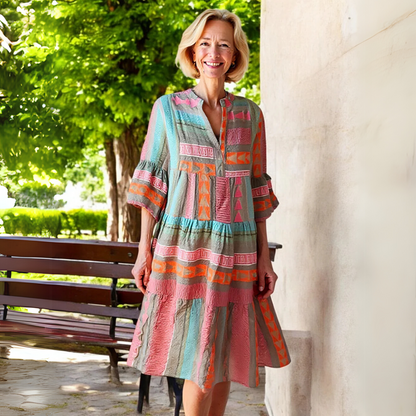 Abito primaverile elegante con taglio a A e volant — Abito fluido e femminile