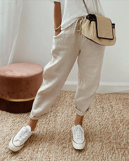 Pantaloni in lino dal taglio tapered — Pantaloni fluidi con vita elastica