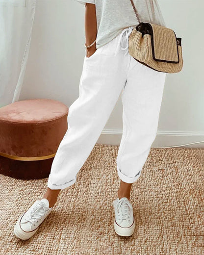 Pantaloni in lino dal taglio tapered — Pantaloni fluidi con vita elastica