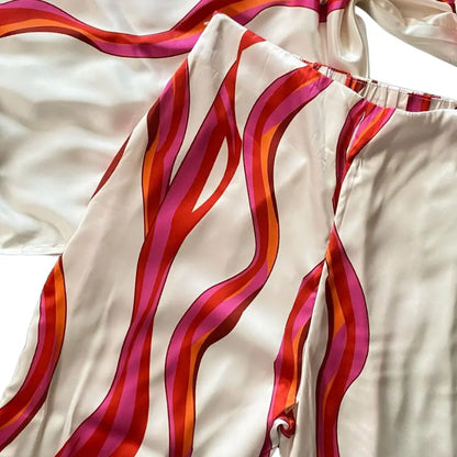 Completo due pezzi con spalle scoperte — Top a maniche a palloncino e pantaloni ampi