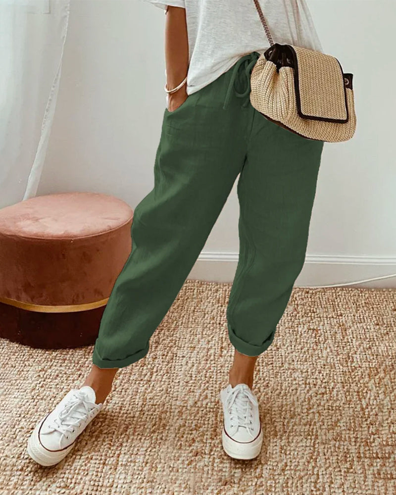 Pantaloni in lino dal taglio tapered — Pantaloni fluidi con vita elastica