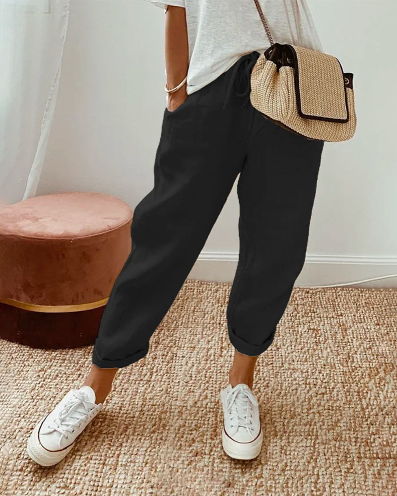 Pantaloni in lino dal taglio tapered — Pantaloni fluidi con vita elastica