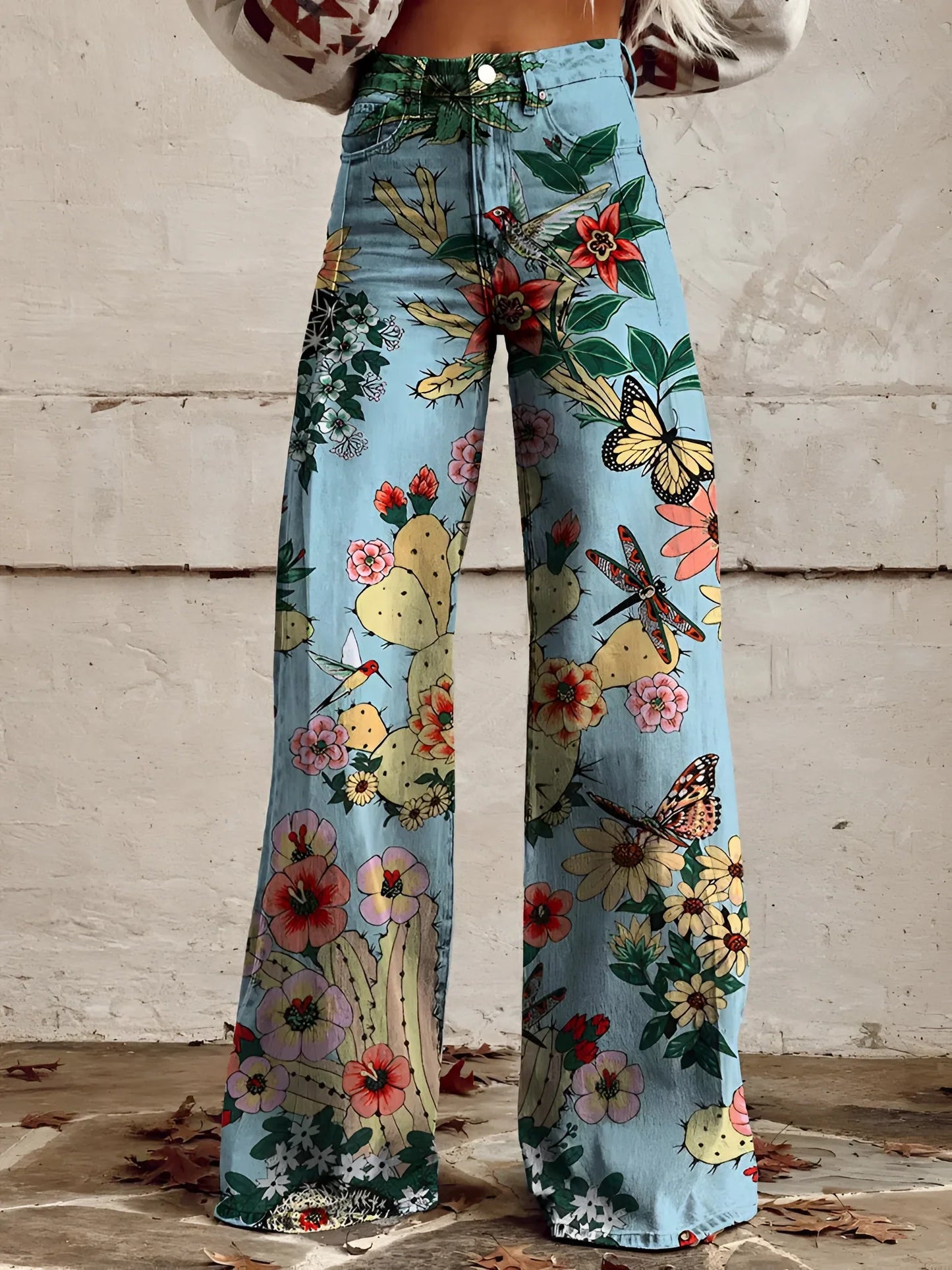 Jeans a gamba larga e vita alta con stampa floreale — Jeans a zampa