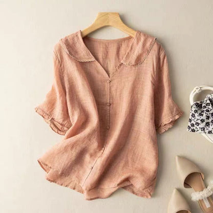 Blusa vintage con collo smerlato e bottoni — Blusa fluida ed elegante