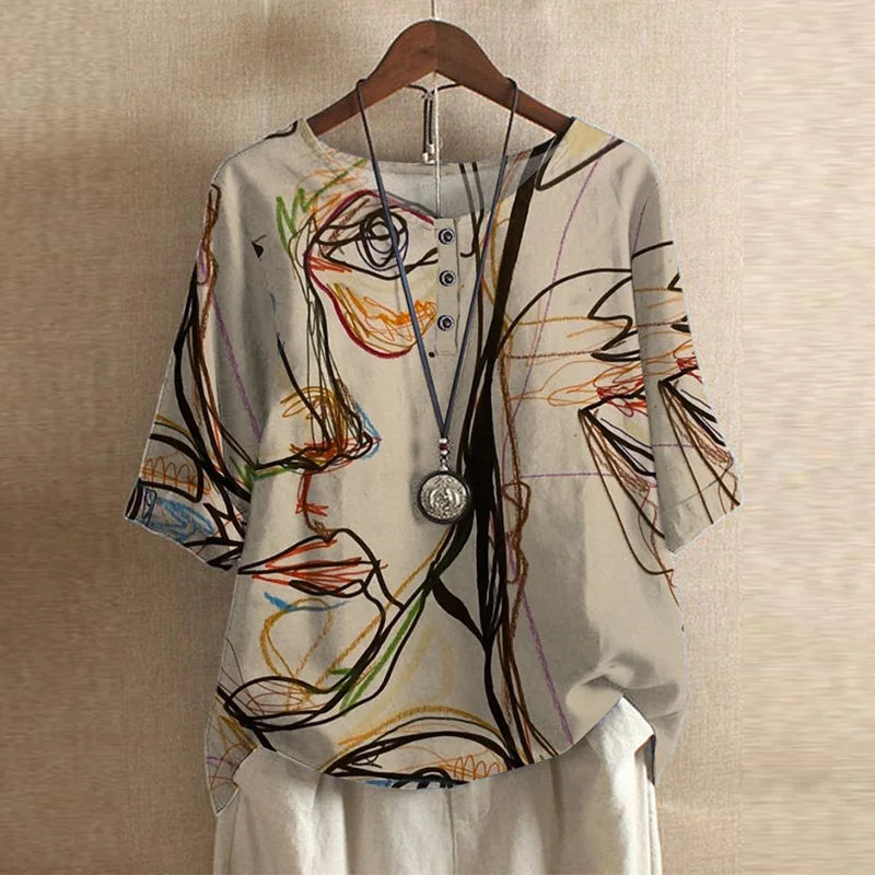 Blusa d'ispirazione retro con stampa floreale — Blusa fluida e versatile