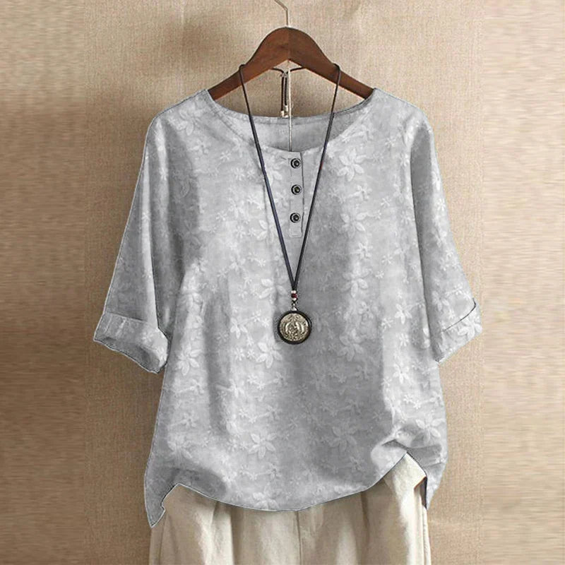 Blusa d'ispirazione retro con stampa floreale — Blusa fluida e versatile
