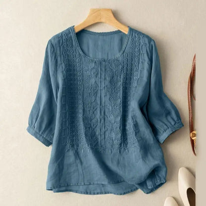 Blusa fluida con ricamo — Blusa morbida e versatile