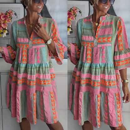 Abito primaverile elegante con taglio a A e volant — Abito fluido e femminile