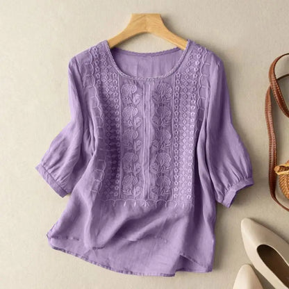 Blusa fluida con ricamo — Blusa morbida e versatile