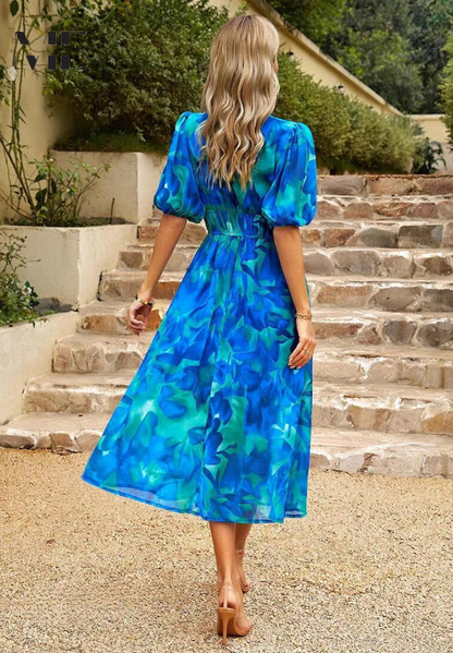 Abito lungo floreale ed elegante — Abito fluido estivo