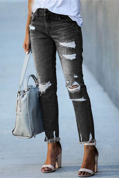 Jeans dritti con strappi e orlo sfrangiato — Jeans a vita media
