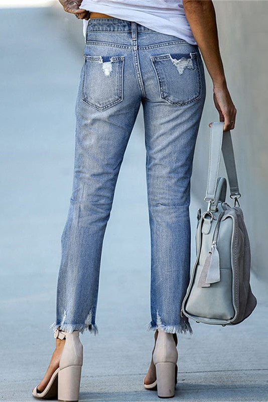 Jeans dritti con strappi e orlo sfrangiato — Jeans a vita media