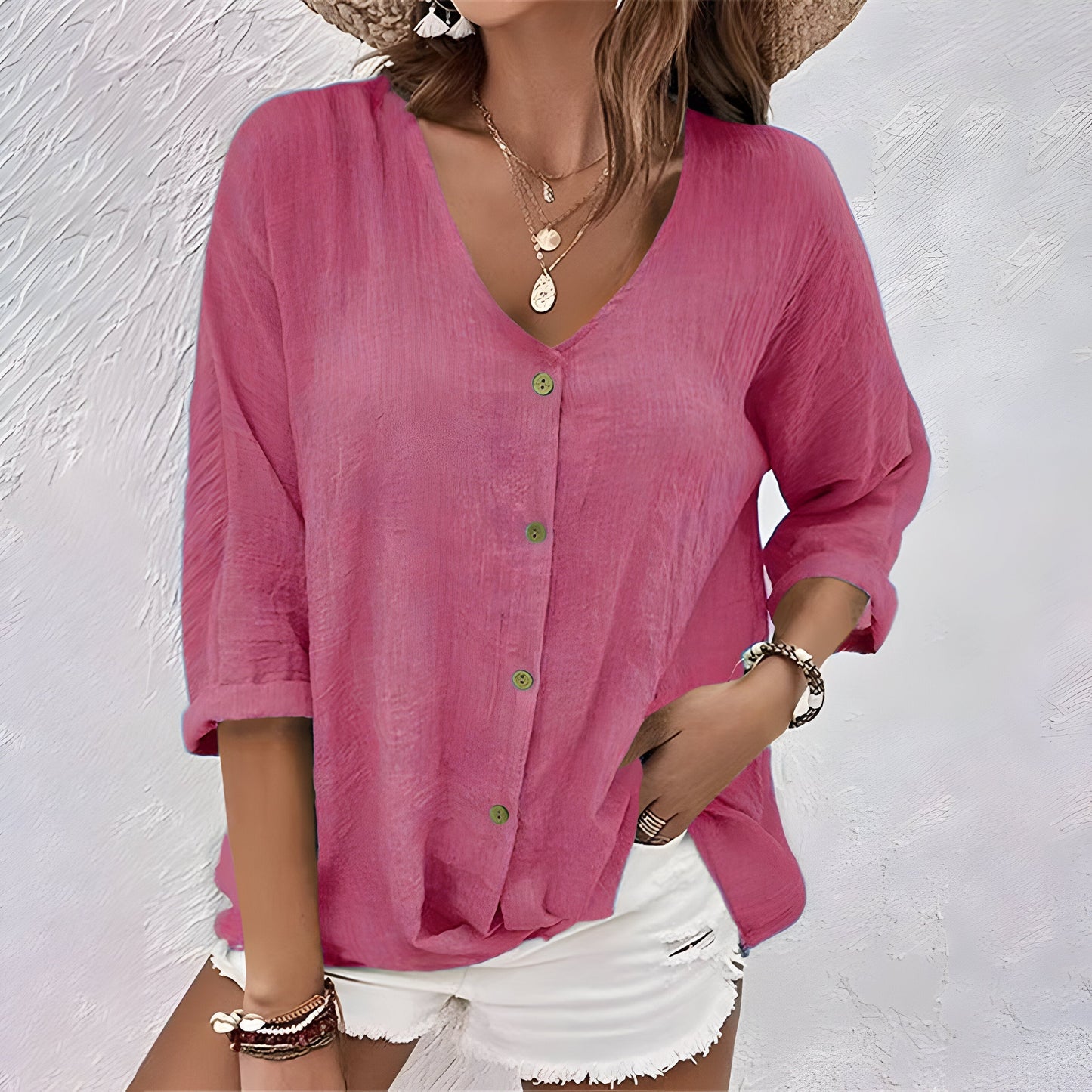 Blusa con bottoni dal taglio rilassato e scollo a V — Blusa fluida estiva