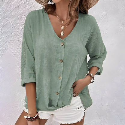 Blusa con bottoni dal taglio rilassato e scollo a V — Blusa fluida estiva